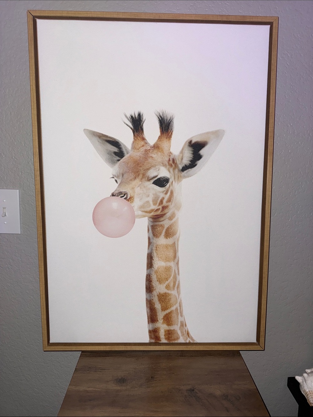 Kate and Laurel Sylvie Bubble Gum Giraffe Framed Canvas Wall Art